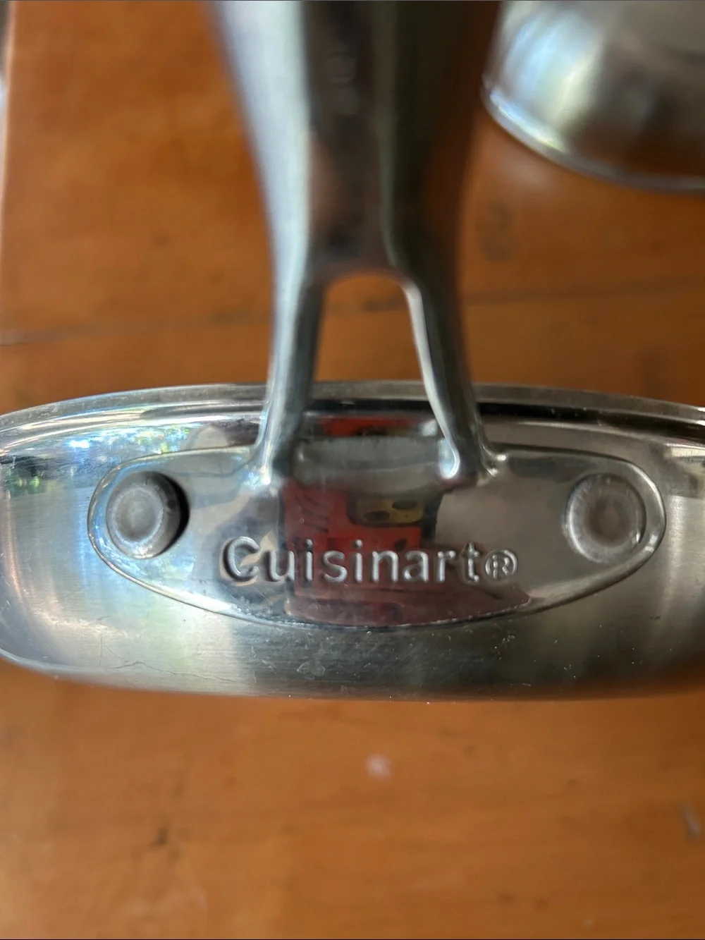 set Cuisinart Chef's Classic stainless steel skillets riveted handles.